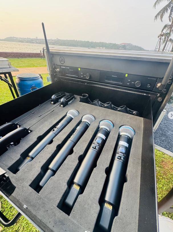 Wireless microphones prepared in a production case